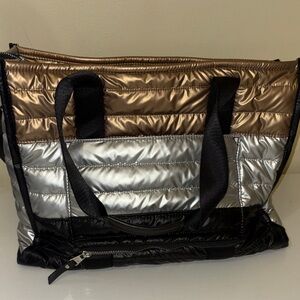 Stylish Black, Silver, and gold women’s travel Bag